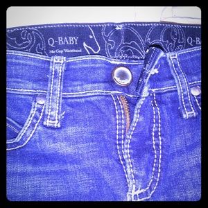 Q baby blue jeans. (Wrangler)